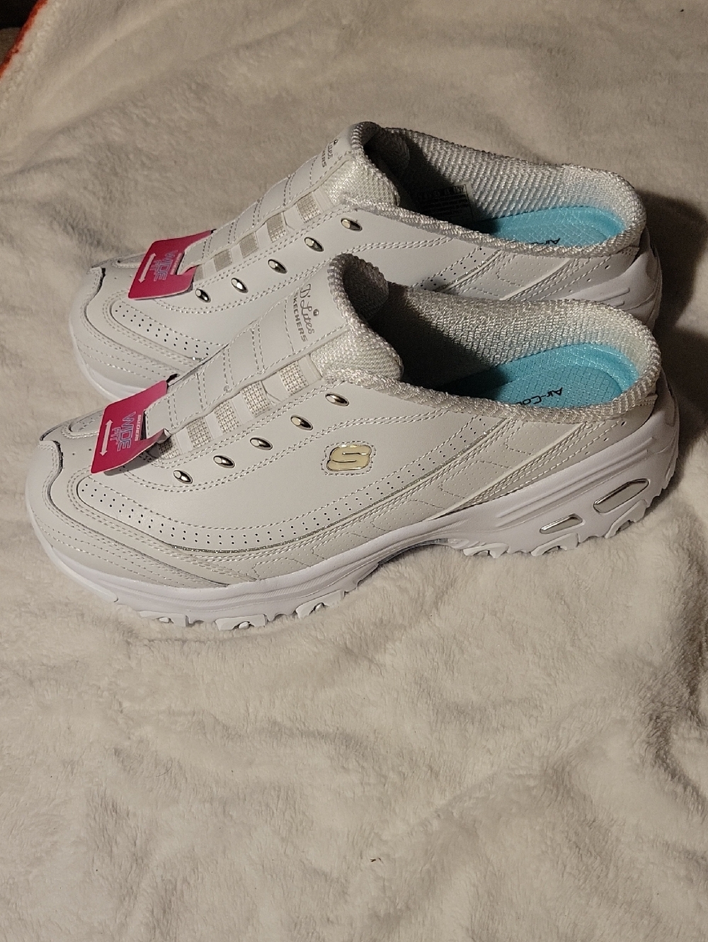 Skechers Women's White Slip-On Sneakers with Light Blue Insole